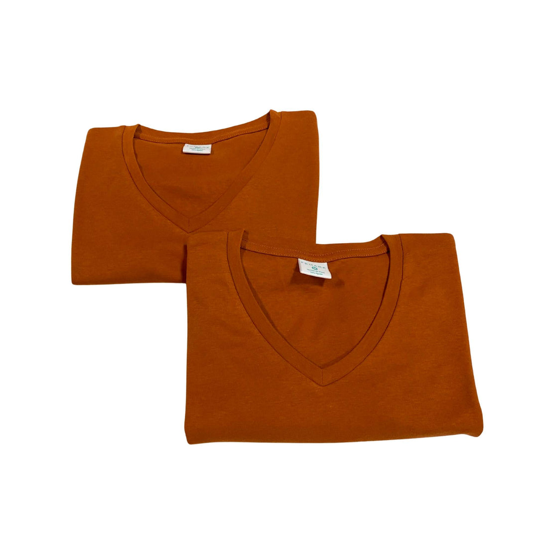 Polo manga corta cuello v color ocre