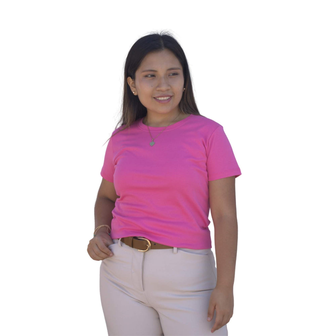 Dama con polo basico manga corta color rosado
