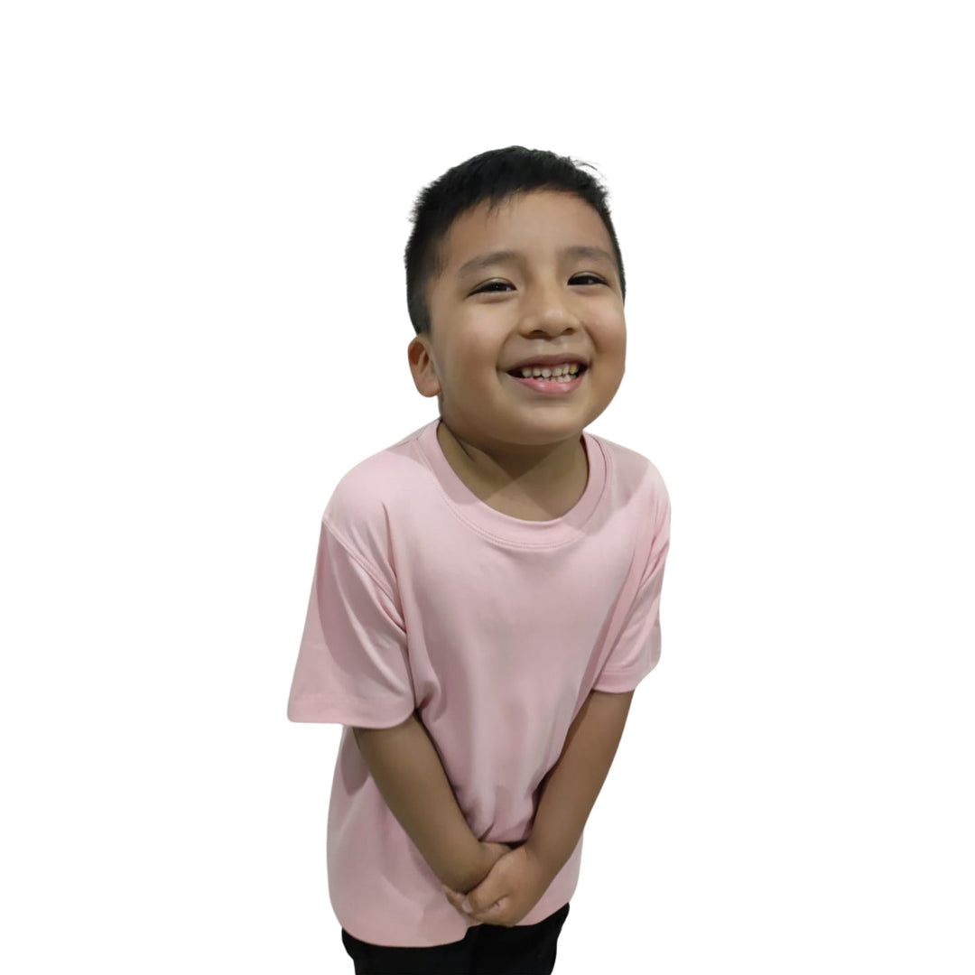 Polo basico para niño en color rosa bebe